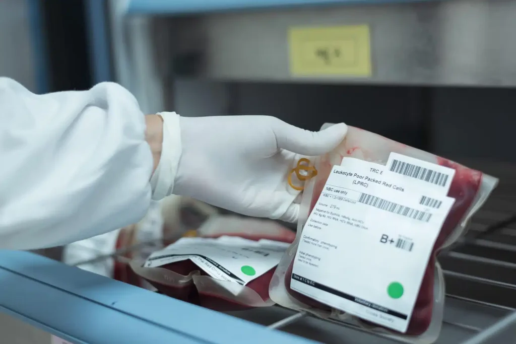 holding blood sample