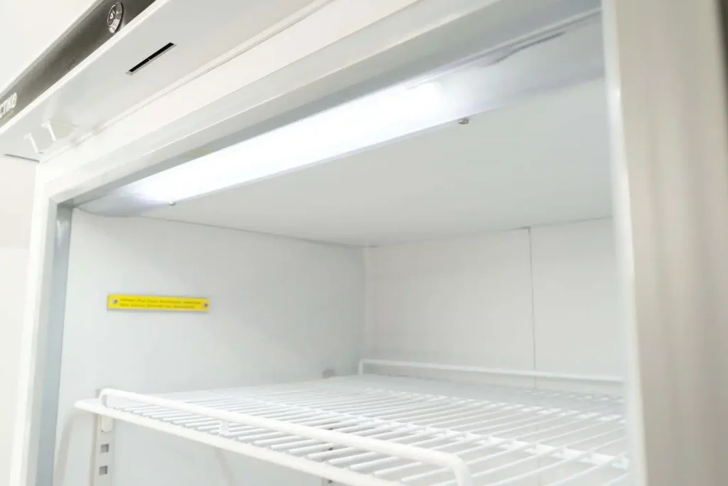 empty shelf in medical freezer